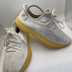 Yeezy White and Yellow Athletic Shoes
